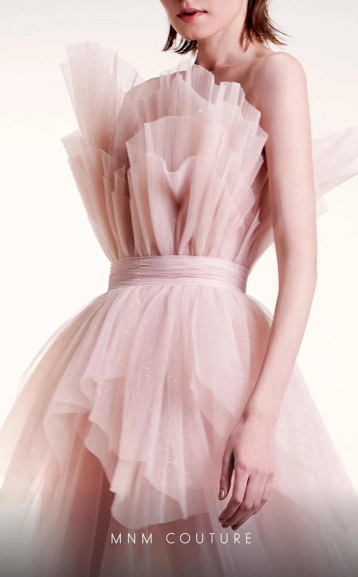 MNM Couture G1435 : Shimmery Elegance with a Layered Peplum Design